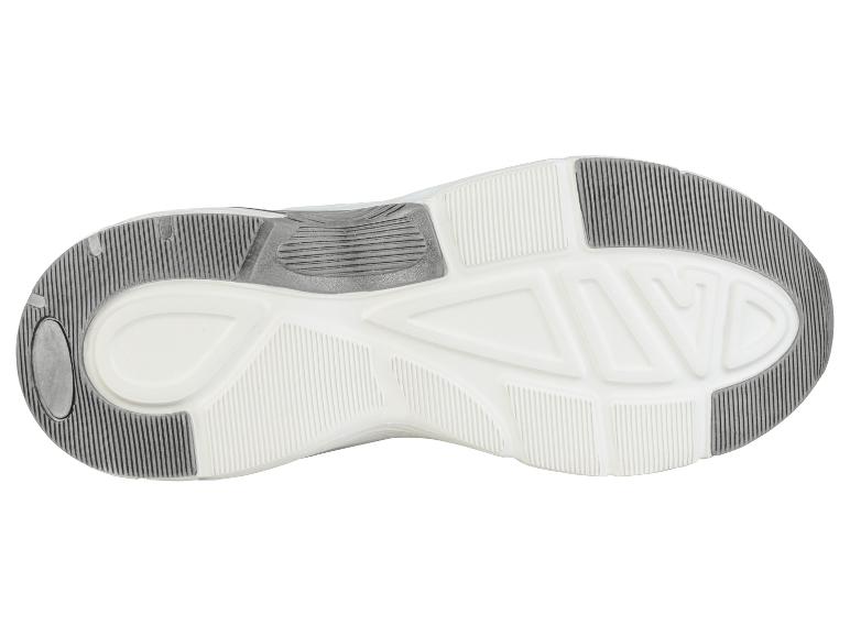 Semelle de basket blanche et grise avec motif de traction.
