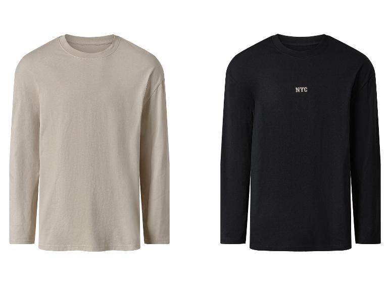 Deux t-shirts à manches longues : un beige et un noir avec le logo 'NYC'.