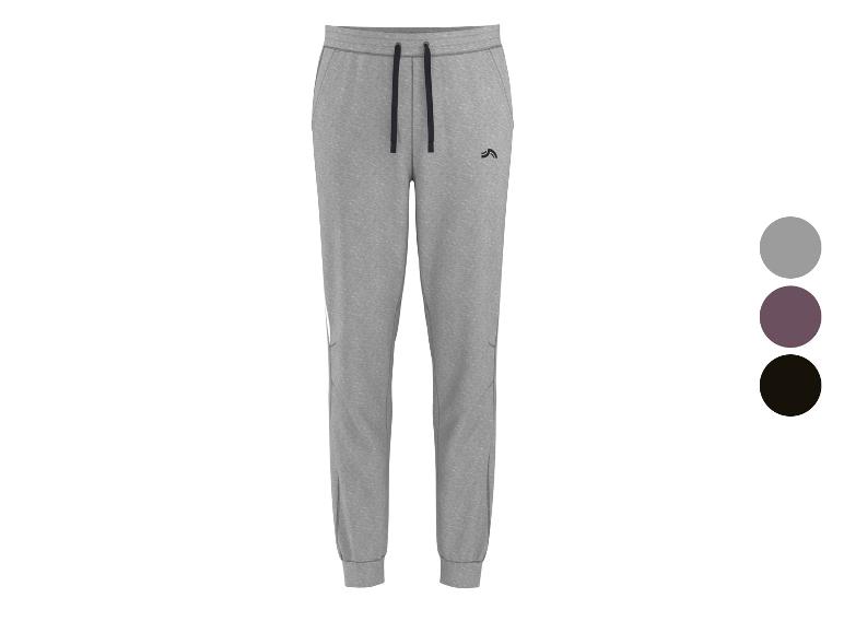 Pantalon de survêtement gris pour homme avec cordon de serrage noir et petit logo noir sur la cuisse gauche.