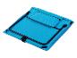 Chaise pliante bleue avec poche zippée, idéale pour le camping ou les loisirs.