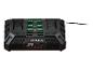 Un chargeur de batterie noir Parkside pour outils avec quatre stations de charge.