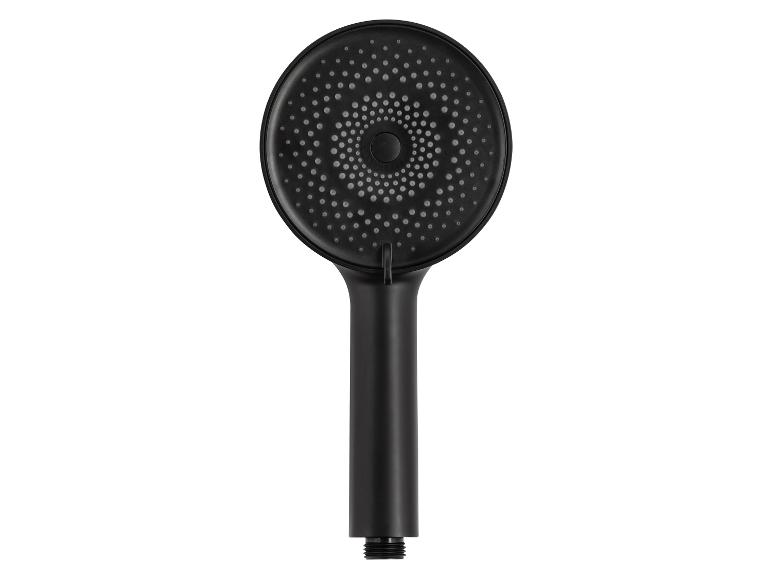Une pomme de douche noire avec un motif de pulvérisation rond.