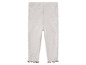 Leggings grises à volants pour bébés.