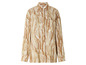Une chemise blanche à manches longues avec un motif ondulé marron.