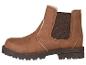 Une botte Chelsea marron avec une semelle en caoutchouc.