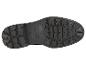 Semelle de chaussure noire avec un motif robuste et des rainures profondes.