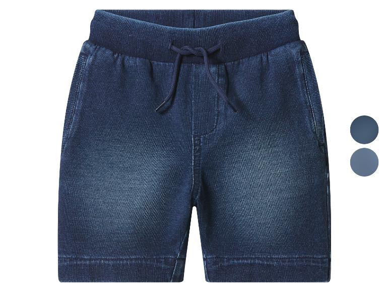 Short en jean bleu foncé pour enfant avec cordon de serrage à la taille.
