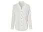 Chemise blanche à manches longues, style minimaliste.