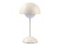 Lampe de table couleur crème en forme de champignon avec ampoule blanche.