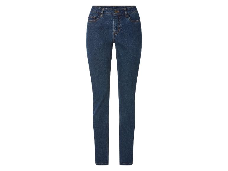 Jean femme bleu foncé avec surpiqûres oranges.
