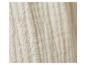 Tissu beige texturé, doux et léger.