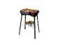 Grill d'intérieur SilverCrest avec légumes et viandes grillés.