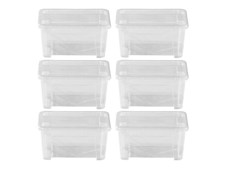 Six boîtes de rangement en plastique transparent avec couvercles, disposées en deux colonnes.