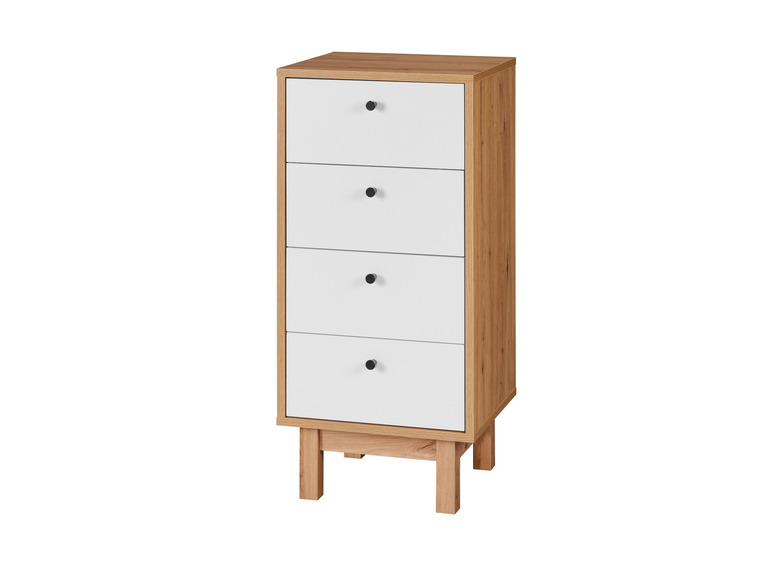 Une commode à quatre tiroirs blancs sur des pieds en bois.