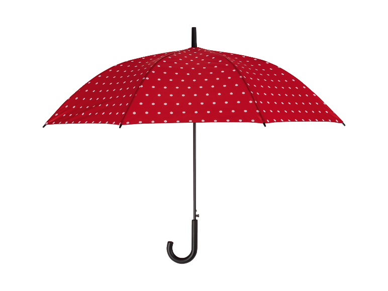 Un parapluie rouge à pois blancs sur fond noir.