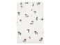 Drap-housse blanc avec motif de champignons marron.