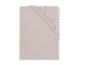 Drap-housse beige clair plié avec élastique