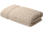 Serviette de bain beige pliée