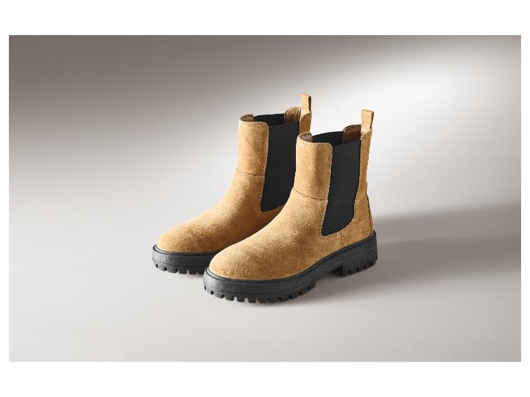 Bottines en cuir premium pour femmes ESMARA® de couleur marron avec semelle noire.