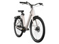 Un vélo électrique blanc avec un porte-bagages et des freins à disque.