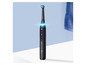 Une brosse à dents électrique Oral-B iO noire sur un fond blanc.