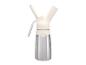 Siphon à crème chantilly en acier inoxydable avec accessoires.