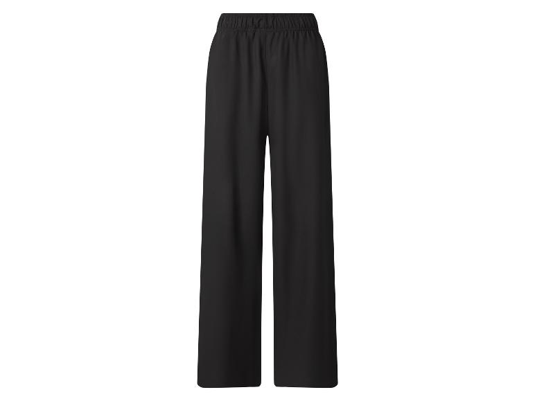 Pantalon noir large avec taille élastiquée.