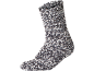 Chaussette épaisse tricotée avec un motif sel et poivre dans les tons gris et blanc.