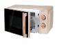 Micro-ondes SilverCrest beige avec commandes rotatives.