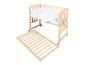 Lit bébé en bois avec matelas et literie, avec un sommier séparé.