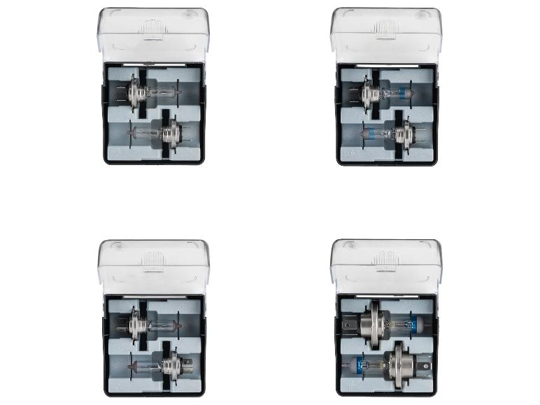 Quatre boîtes ouvertes avec deux ampoules de voiture chacune, de différents types.