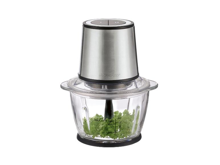 Hachoir avec bol en verre et persil haché