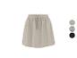 Jupe beige avec taille élastique et cordon de serrage, disponible en trois couleurs.