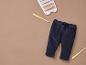 Pantalon de bébé avec un xylophone et des baguettes
