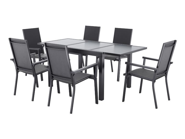 Ensemble de salle à manger d'extérieur avec table extensible et six chaises gris foncé.