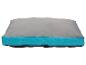 Coussin pour chien gris et turquoise.