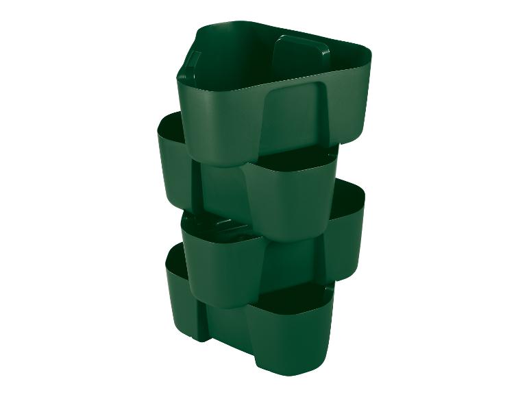 Jardinière verticale vert foncé avec plusieurs pots empilés