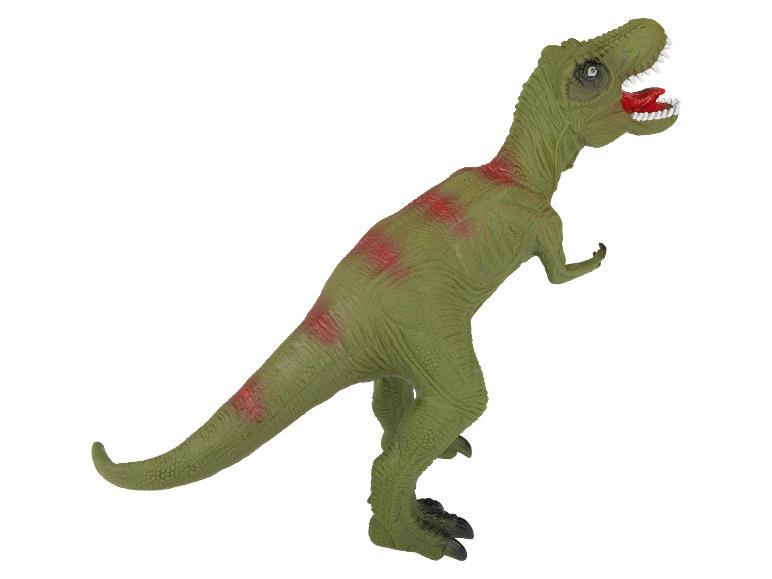 Un jouet dinosaure T-Rex en plastique vert.