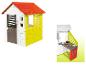 Smoby maisonnette enfant avec cuisine et accessoires.
