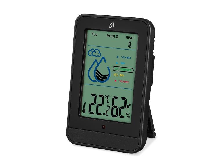 Un thermomètre et un hygromètre numériques avec un écran qui affiche la température et l'humidité.