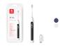Brosse à dents électrique Oclean X Lite avec des fonctions intelligentes et un câble de charge.