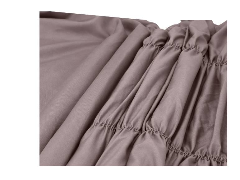 Tissu drapé mauve avec fronces décoratives.