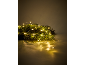 Guirlande de Noël avec des lumières LED blanc chaud sur fond sombre.