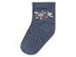 Chaussette bébé bleue à motif floral.
