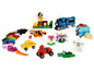 Ensemble Lego Classic avec train, voiture, fleurs, animaux et autres briques.