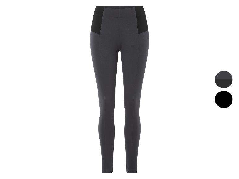 Leggings gris foncé avec des détails noirs.