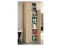 Haut meuble en bois avec classeurs et livres colorés, à côté d'un bureau blanc.