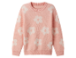 Pull rose clair à motif floral blanc.
