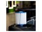 Cartouche de filtration pour piscine HOME DELUXE Marble Deluxe sur le rebord d'un jacuzzi.