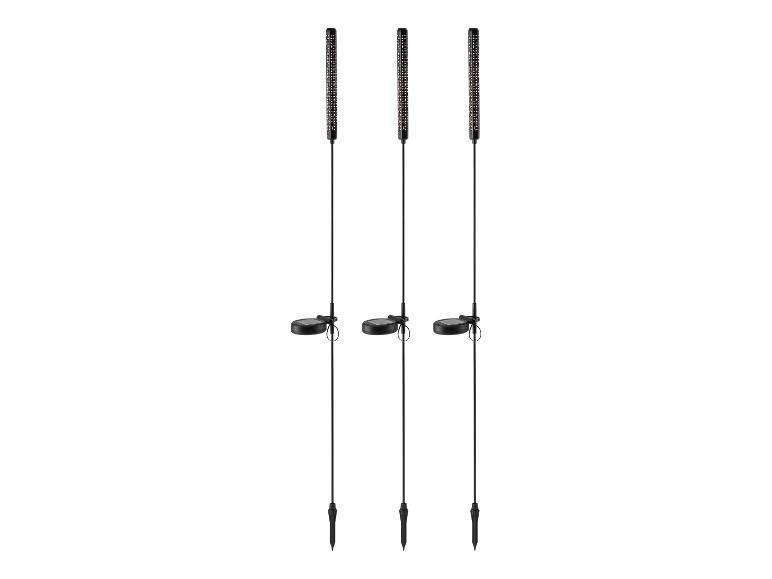 Trois lampes solaires de jardin noires avec piquet